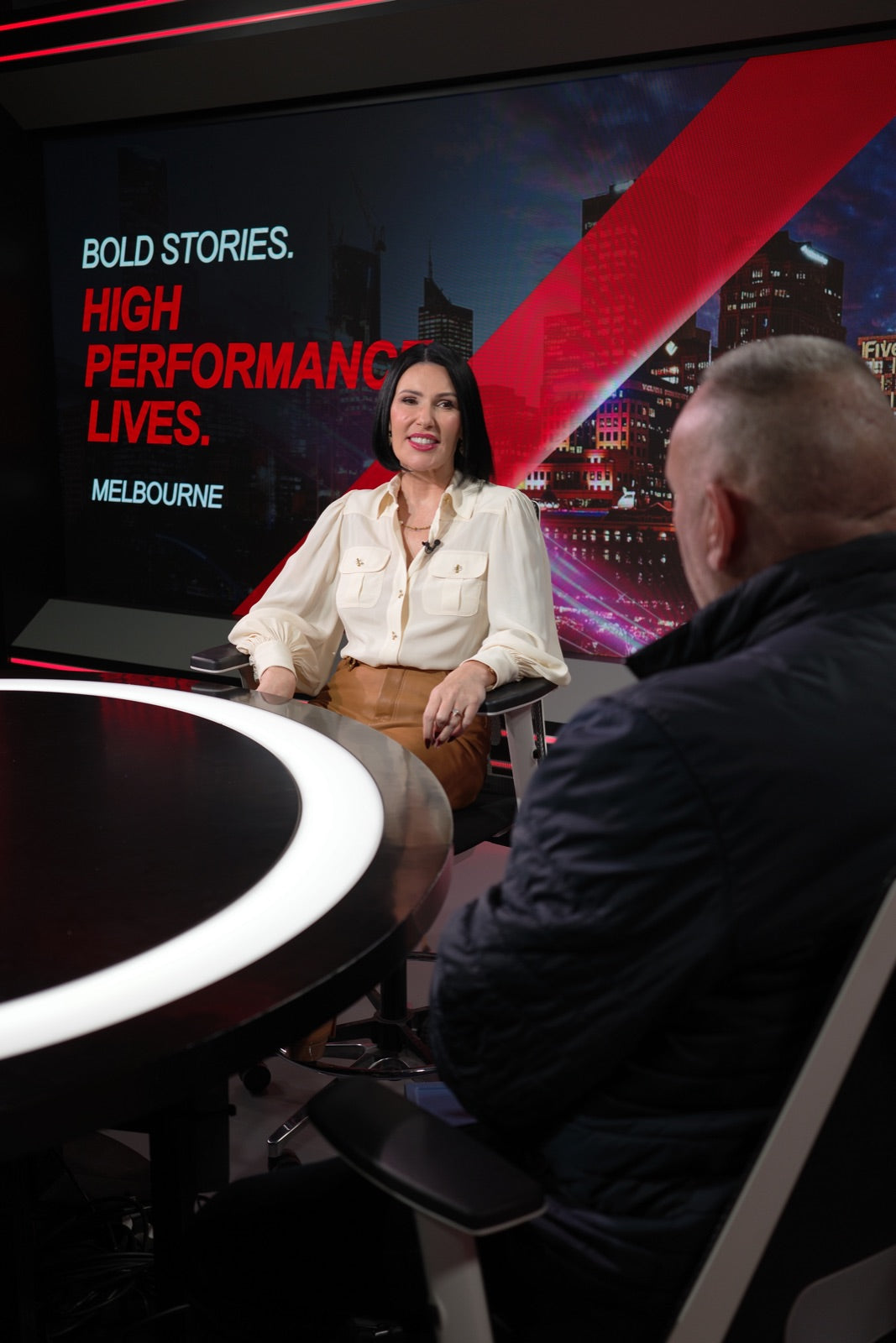 In conversation on set